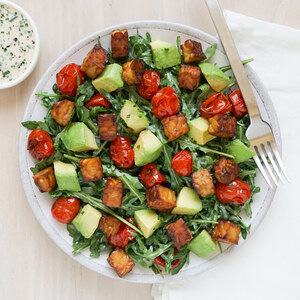 Arugula-Tempeh Salad with Blistered Tomatoes, Avocado & Chive Dressing