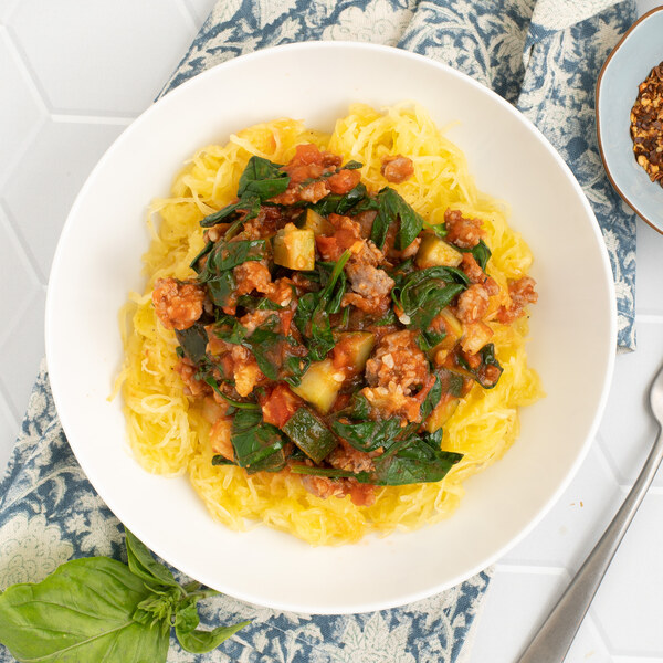 Pork Sausage Ragù with Zucchini, Spinach & Basil over Spaghetti Squash
